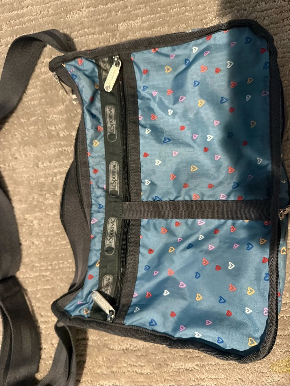 Lesportsac Teal w hearts cross body bag